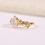 Oval Diamond Nature-Inspired Engagement Ring with Pear & Marquise Accents