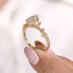 Oval Diamond Nature-Inspired Engagement Ring with Pear & Marquise Accents