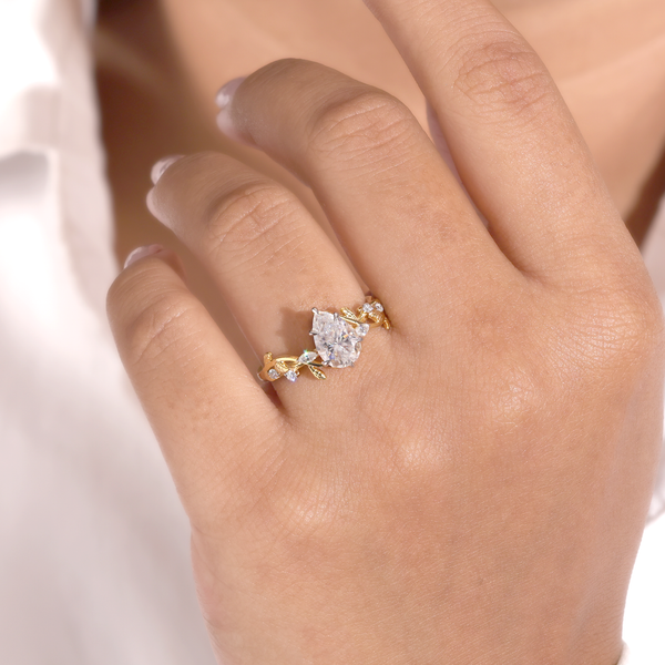 Oval Diamond Nature-Inspired Engagement Ring with Pear & Marquise Accents