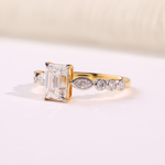 Emerald Cut Diamond Side Stone Ring In 14k Gold