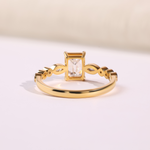 Emerald Cut Diamond Side Stone Ring In 14k Gold
